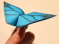Бабочка с хлопающими крыльями